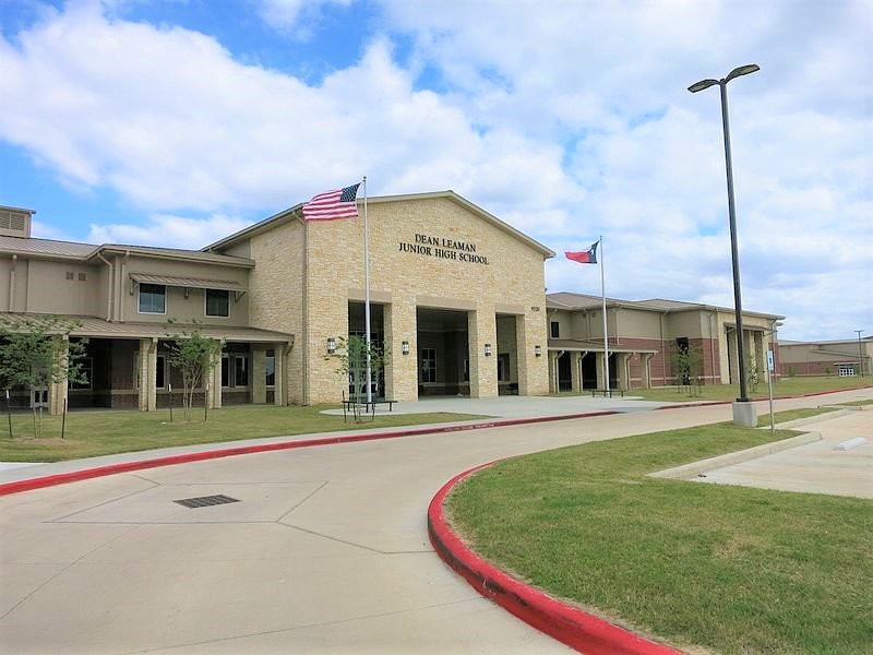 Lamar Consolidated ISD – Churchill Fulshear Jr. - High School & Dean Leaman Junior High SchoolThe Lamar CISD Churchill Fulshear High School and Dean Leaman Junior High School educational complex encompasses a 166 acre site. The approximately 590,000 SF of structures are comprised of a two-story high school, two-story junior high school, a single story athletic field house, single story transportation building, concession stands and ticket booths. Other elements include a competition football field, running track and field events, several football/soccer practice fields, baseball field, softball field, tennis courts, detention pond and extensive concrete paving. All structures are covered with standing seam metal roofing and include striking architectural features such as natural stone accents and expansive main street corridors. Back to Portfolio
